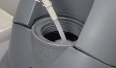 Crewman solution tank fill port